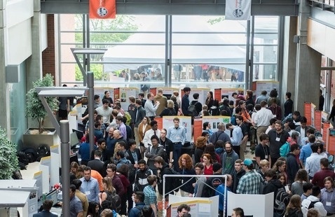 Group of people in large meeting space