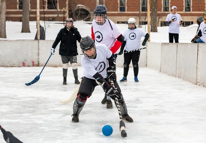 Student playing Broomball