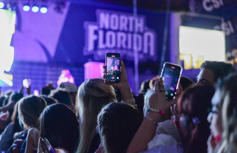 Crowd of students enjoying concert music at Amphitheater 