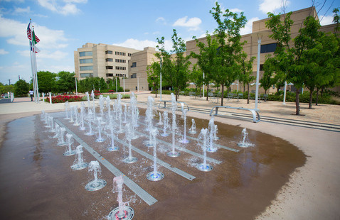 The fountains in front of the library on campus,