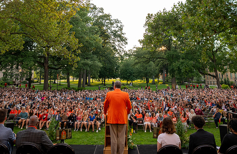 students gathered outside infront of president rogers for convocation