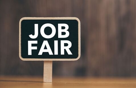 a sign that reads job fair