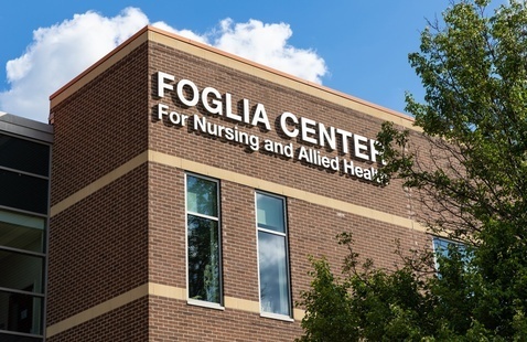 Exterior showing the Foglia Center for Nursing and Allied Health sign