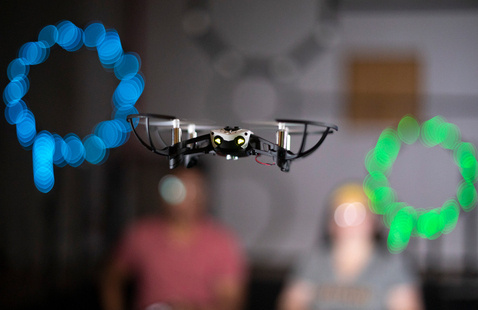 Drone flying though an obstacle course in the UAlbany Drone Lab.