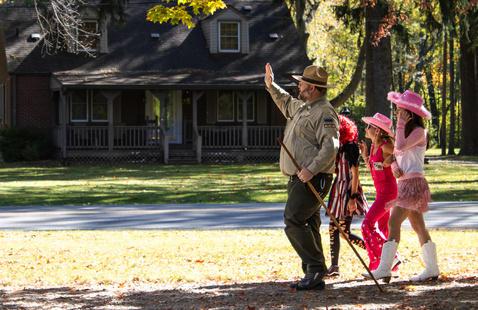 Naturalist with campers in costume