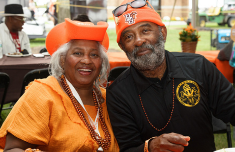 Couple wearing BGSU spirit gear.