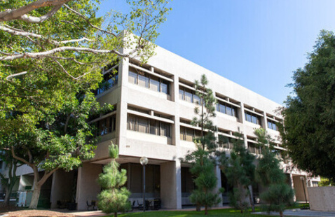 Exterior of USC Gould School of Law's 3 story gray building