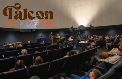 a photo of the planetaium at BGSU filled with guests