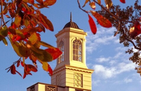 FSB cupola in fall with red leaves around it