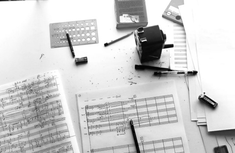 New music being created with paper and pencils