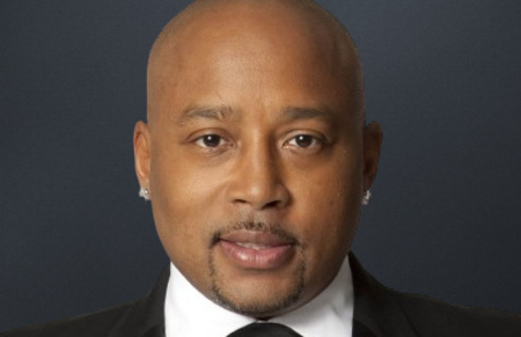 Headshot of Daymond John.