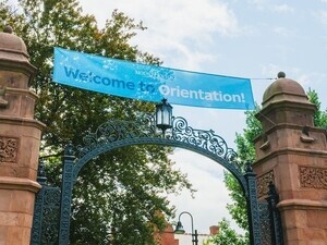 Welcome to Orientation banner hung across the Gates.