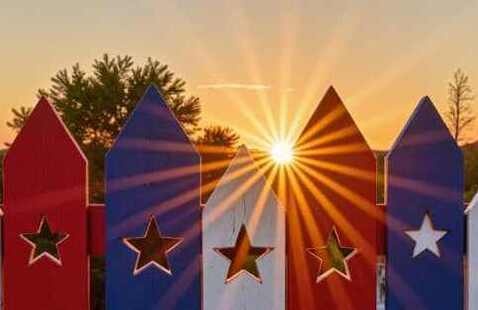 Fence posts and sunrise