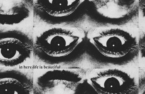 Eyes with a caption "In here life is beautiful..."