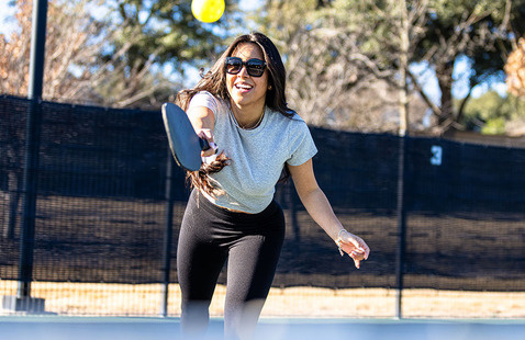 woman playing pickleball