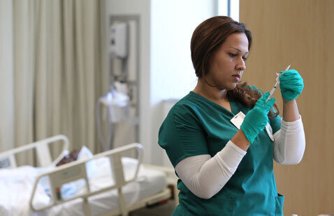 An image of a student in the Nursing Program at Oakton College.