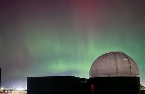 a photo of the BGSU Planetarium with stargazing