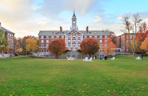 Harvard University brick building dormitory during the fall.