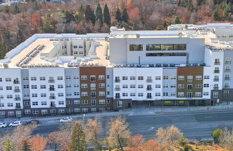 Pack Place exterior showing bird's eye view of building and surrounding road and trees