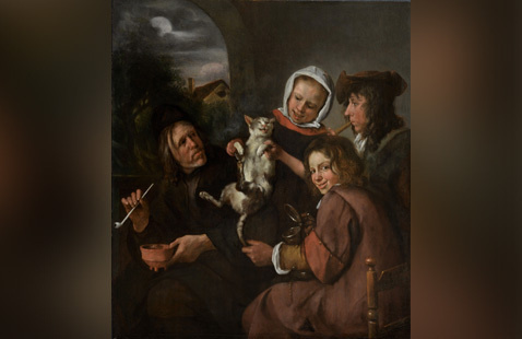 Appears to be an image of a family and a small child huddled closely together.