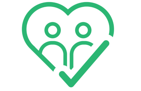 an outline of a heart with two figure drawings inside.