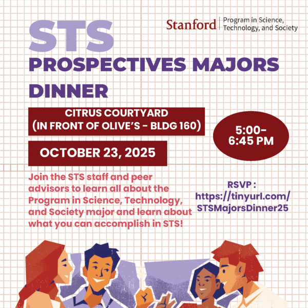 A group of students standing at a table eating