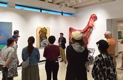 Visitors taking a tour at MAG.