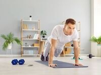 An individual doing an exercise routine