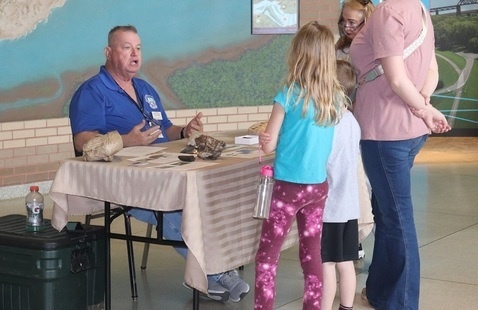 Volunteer, Dale Brown, is knows about fossils and loves to share his knowledge.