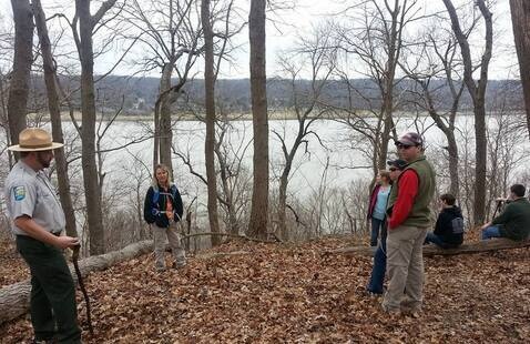 Ranger and Hikers atop bluff over looking Ohio River