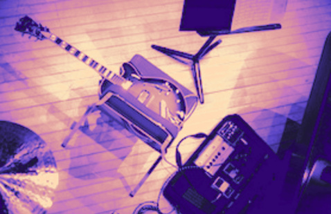 jazz guitar with amp, sheet music and cymbal