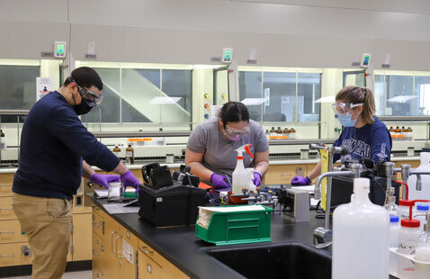 Appears to be an image of students working in a science lab.