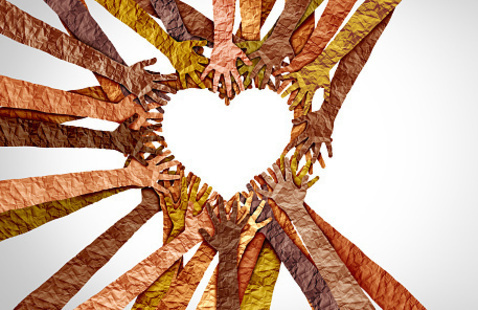 different colored hands in a heart