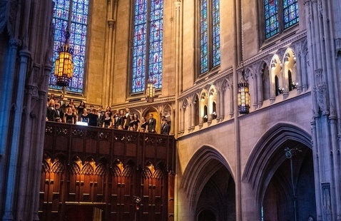 Heinz Chapel Choir singing at the front of Heinz Chapel
