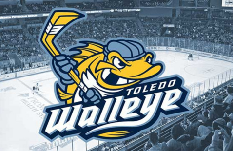 Toledo walleye logo with the hockey game going on in the background all with a blue tint