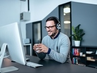 An individual taking part in webinar