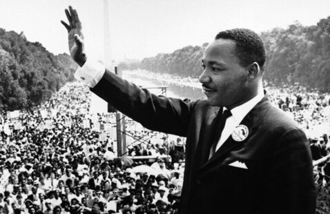 Martin Luther King addresses a crowd from the steps of the Lincoln Memorial