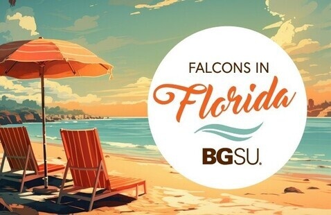 Orange beach chairs and umbrella on a sandy beach beside the ocean with text that reads Falcons in Florida BGSU