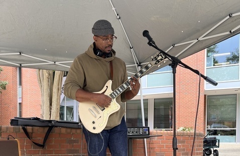 Musician plays guitar