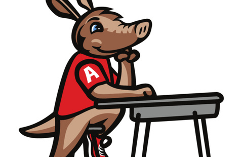 Graphic of Arty the aardvark sitting at a school desk