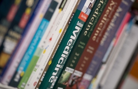 Photo of medical books on a shelf
