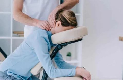 Photo of someone receiving a chair massage 