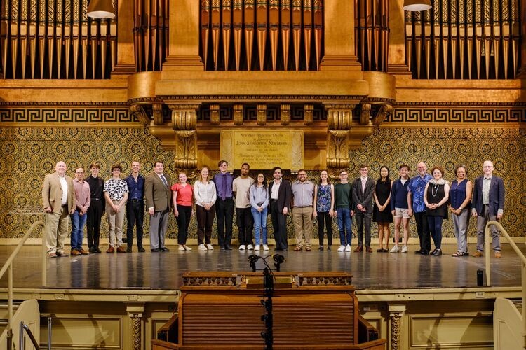 Organ faculty and students in front of Newberry Organ