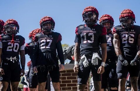 Lenoir-Rhybne football team on the field in Moretz Stadium