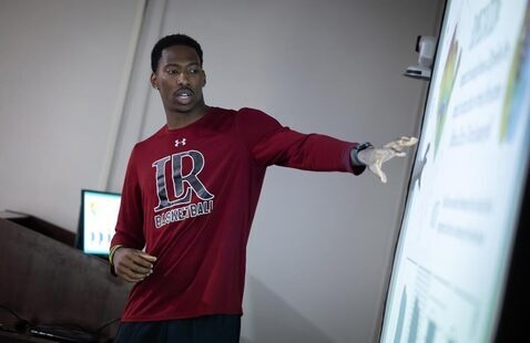 A student presents their research during SOURCE Day presentation