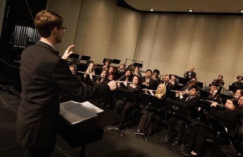 Wind Ensemble performs on stage during concert at LR