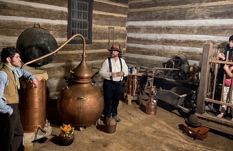 Distillery in the village, the operation being explained by Alan Bishop 