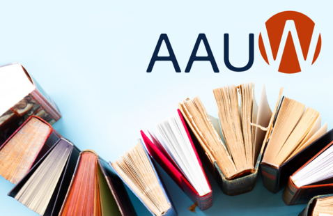A semicircle of books with the  American Association of University Women (AAUW) logo above
