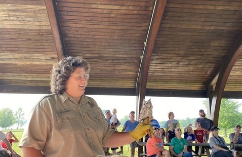 Teresa Rody with a Screech Owl