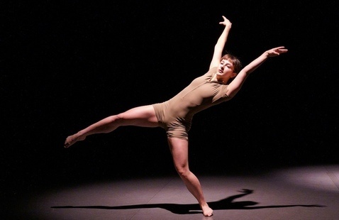 dancer leaning back on one leg